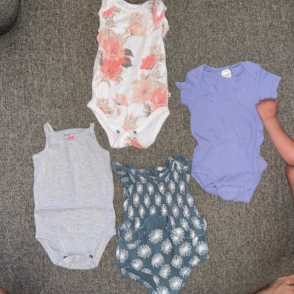 4 body suits. 6-9 months 12 months